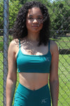 Sun's Out Twist-Back Sports Bra in Emerald Green